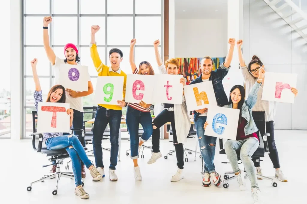 A group of people holding up signs that say " together ".